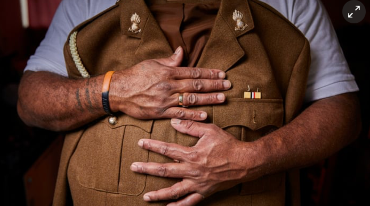 Fijian vet holding number 2 military dress